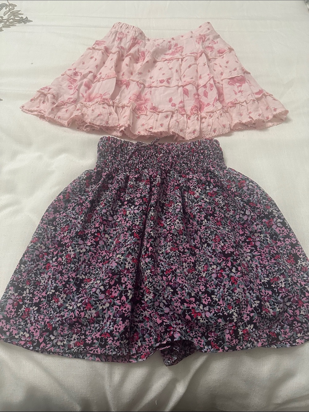 Altar'd State Pink Ruffled Tiered Skirt & Black Floral Smocked Skirt Set